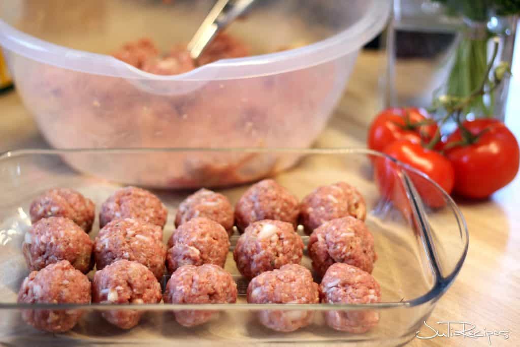 raw meatballs in dish