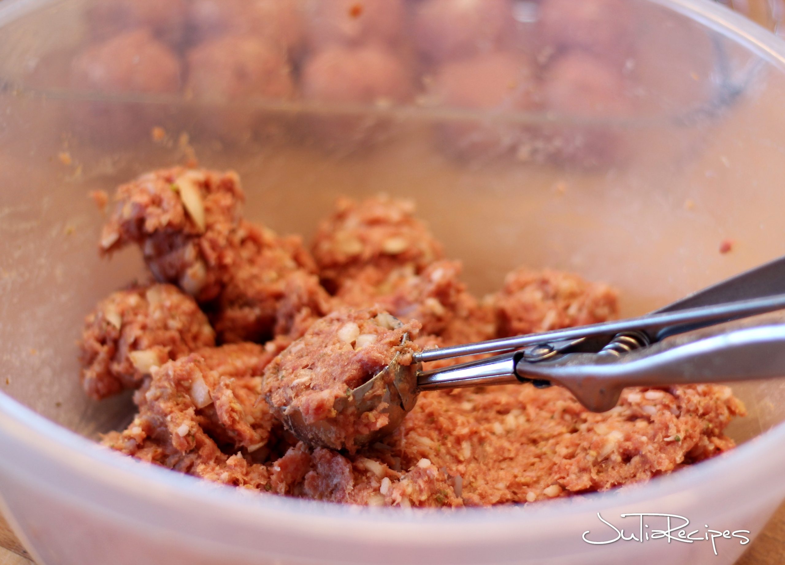 scooping trio gourmet ground meat for meatballs