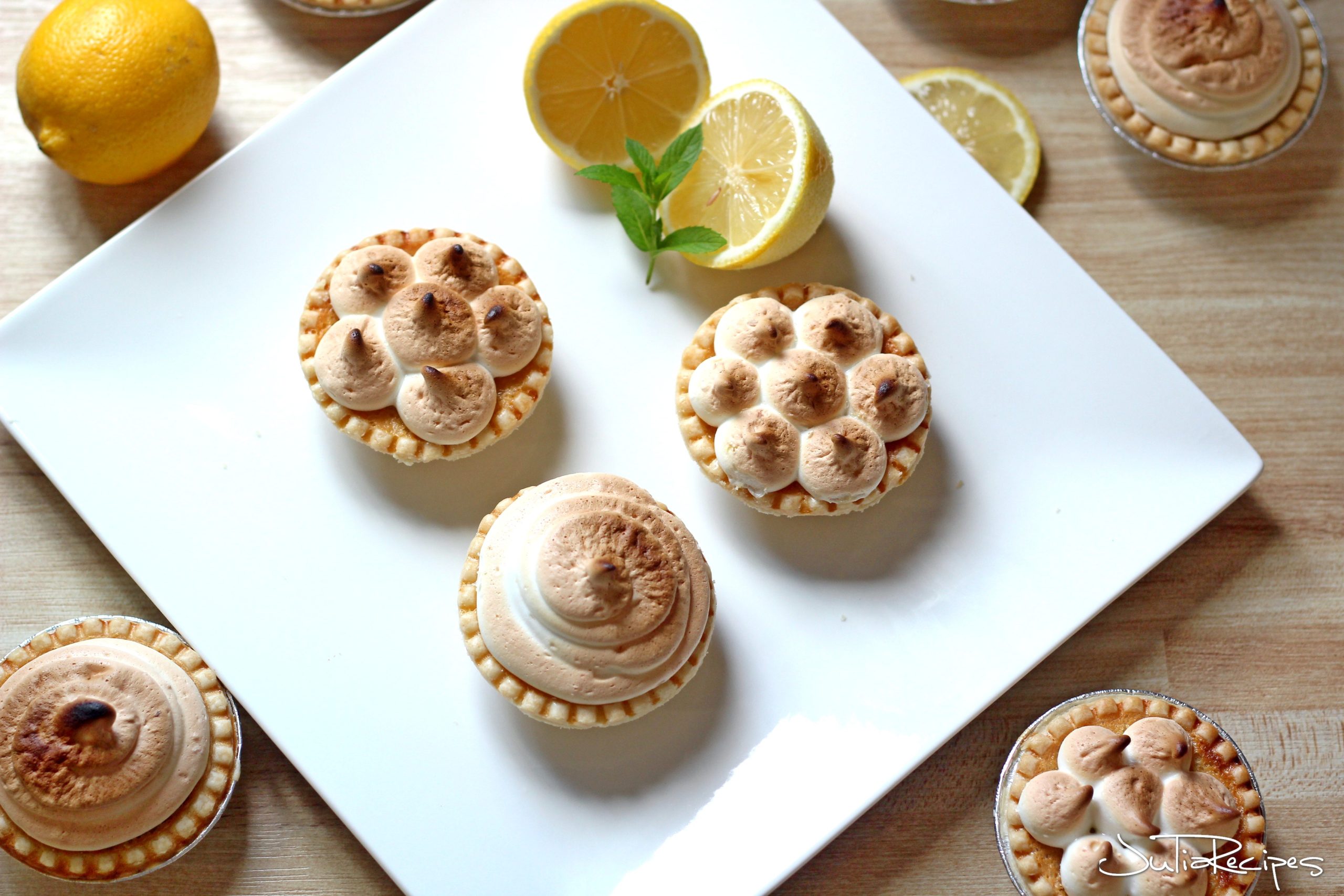 lemon tarts piped with meringue