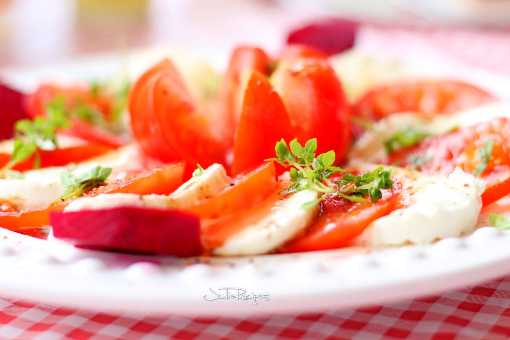 Capresse salad with tomatoes and mozzarella cheese