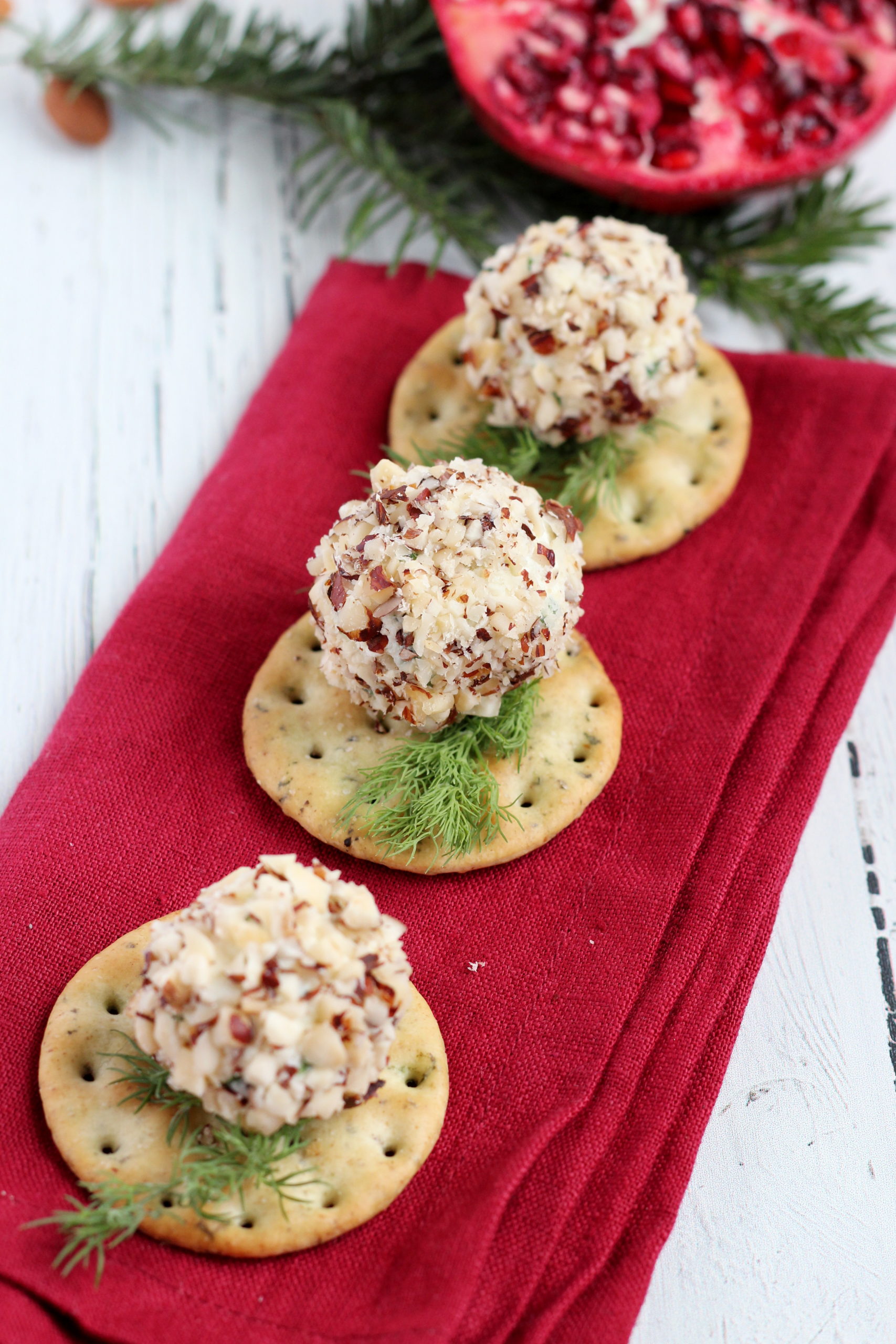 cheese balls covered in chopped almonds
