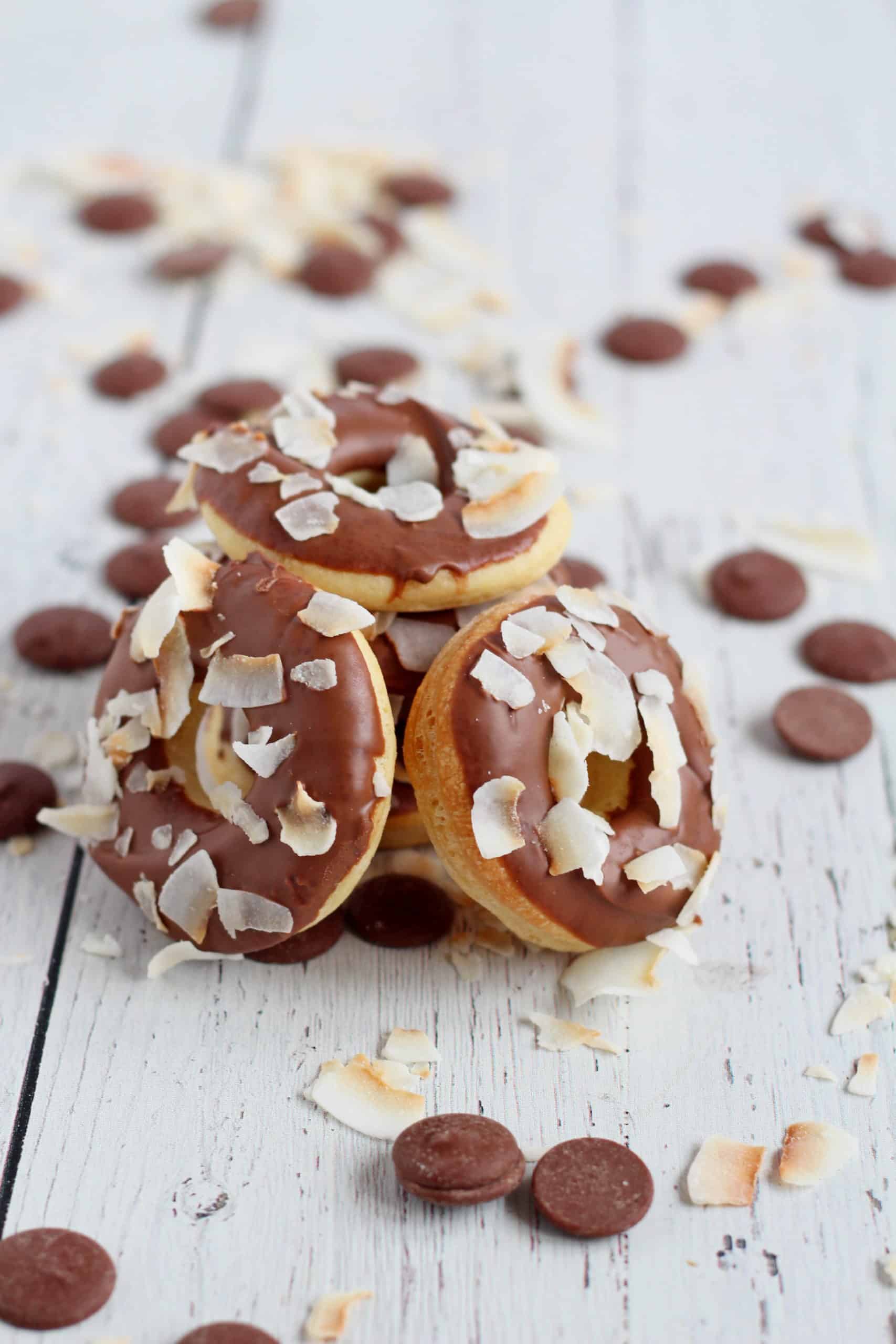 donuts baked in oven with chocolate glaze and toasted coconut flakes