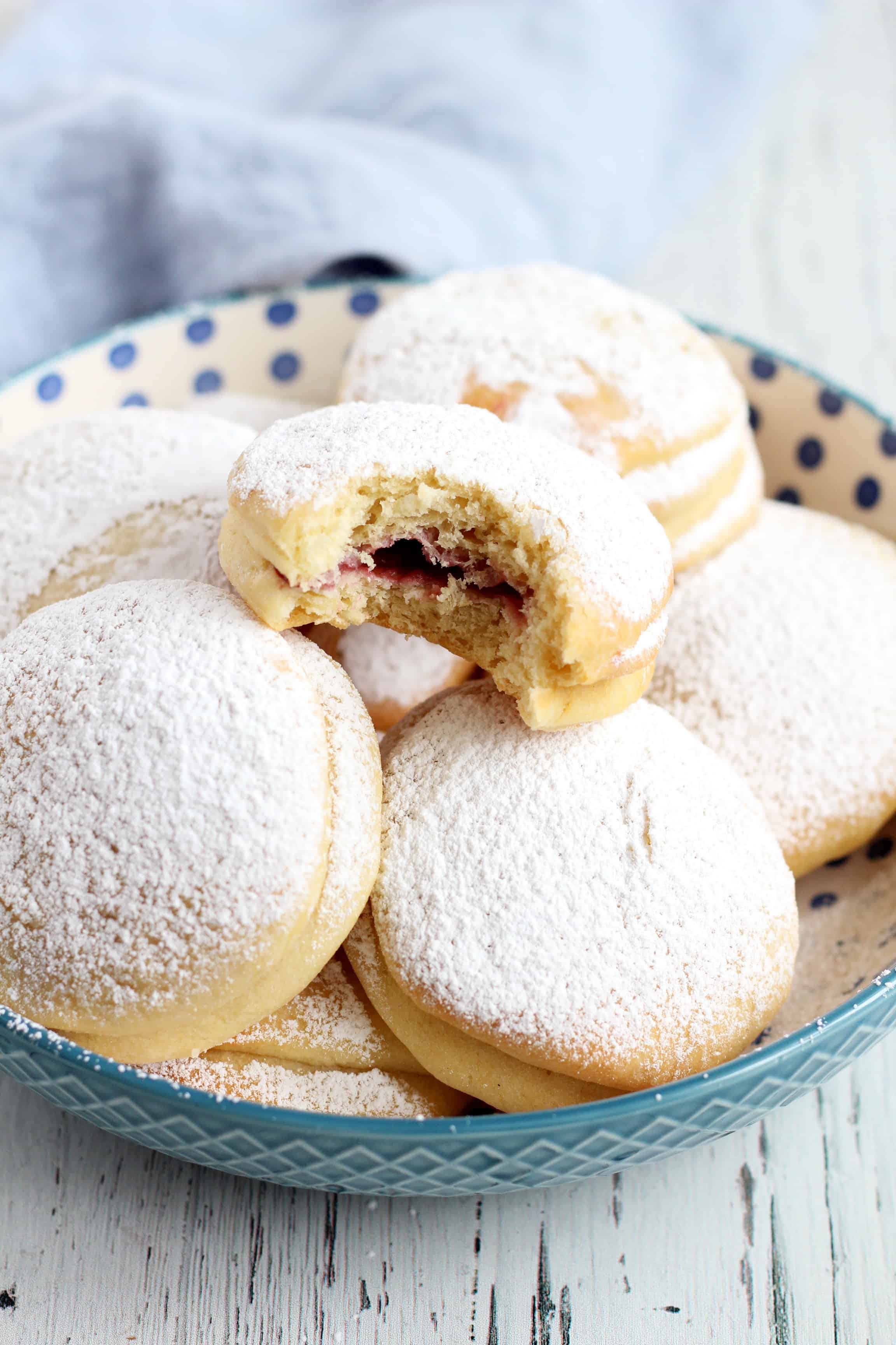 Baked donuts filled with raspberry jam