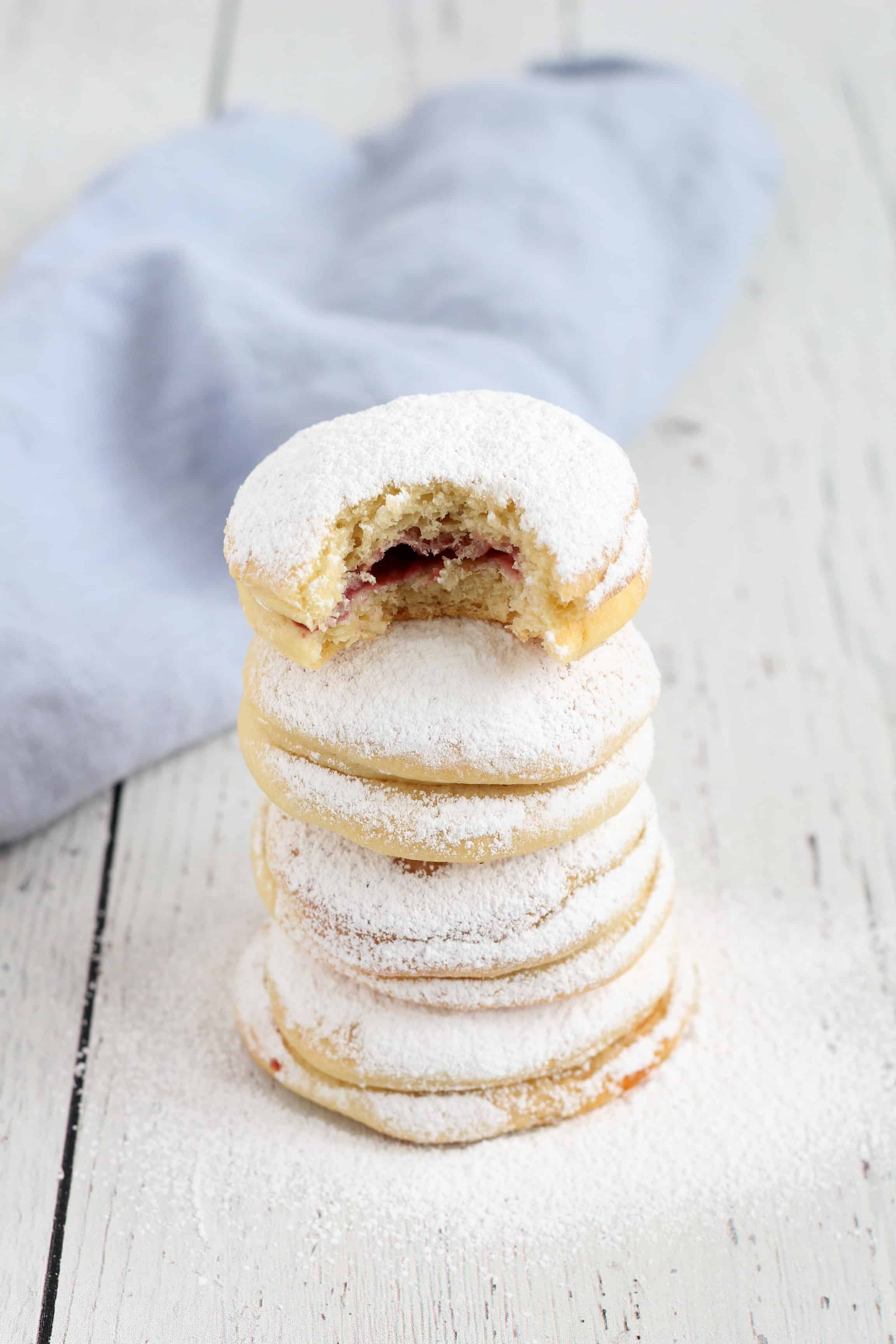 Baked donuts filled with raspberry jam
