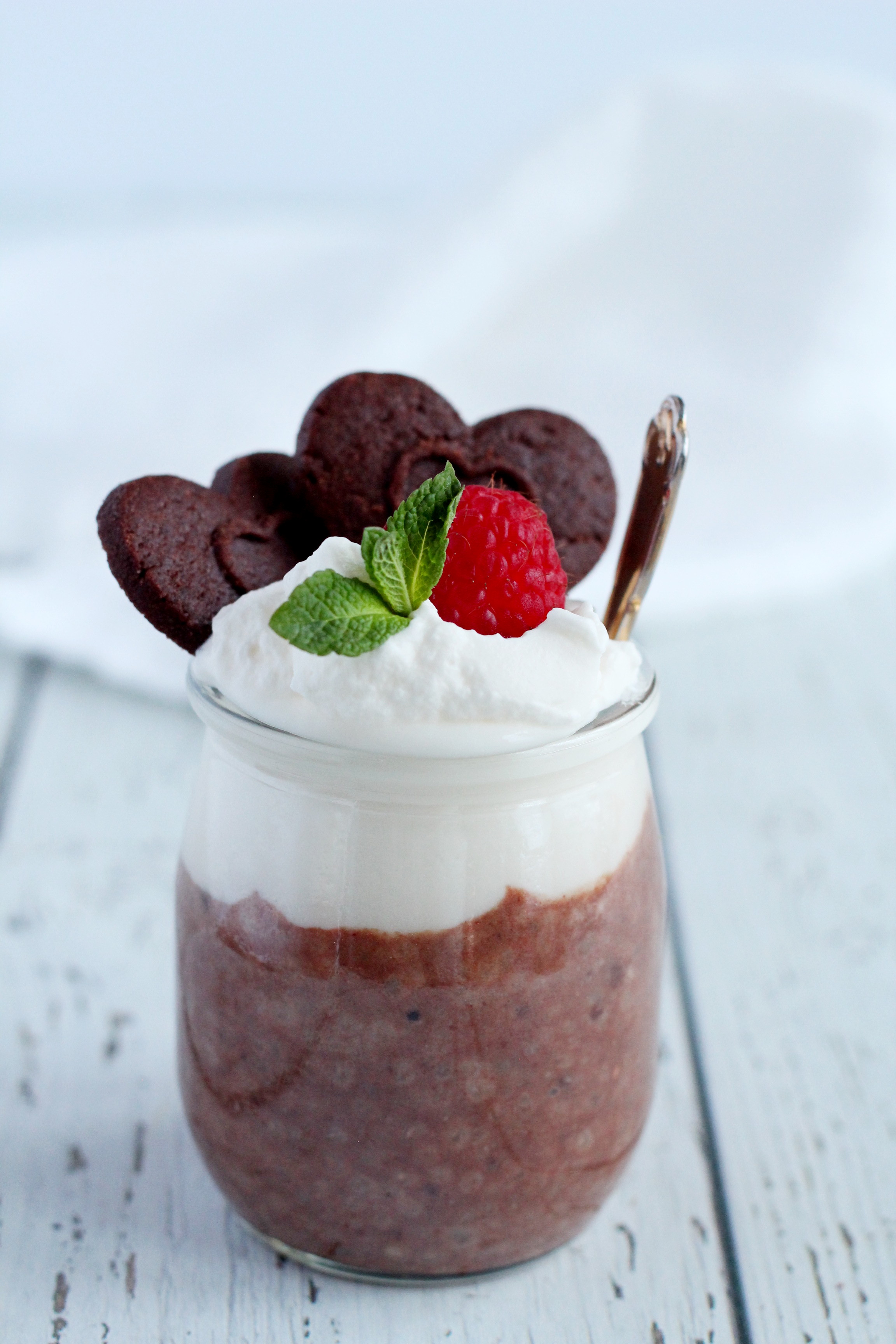 chocolate chia pudding with heart cookies