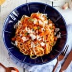 bolognese spaghetti sauce in blue plate