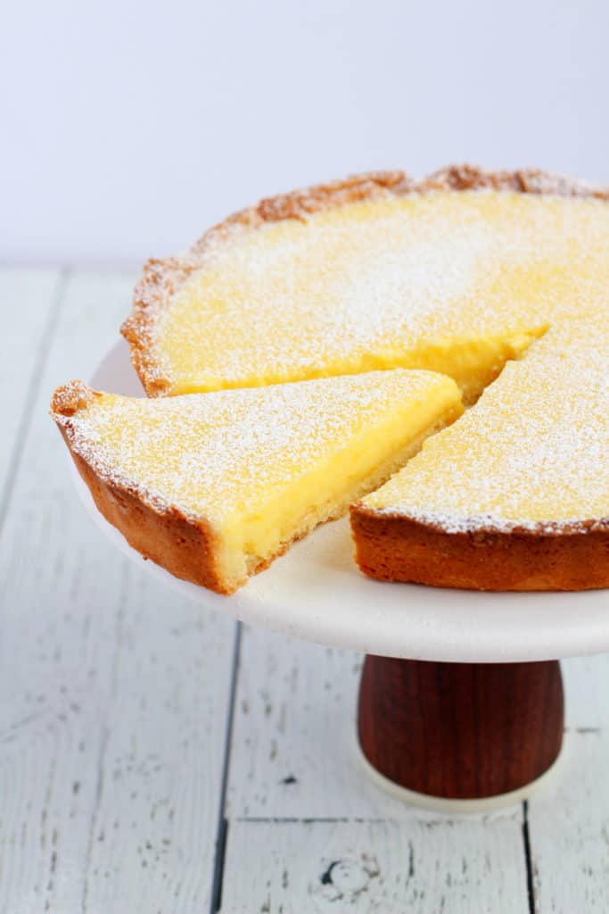Lemon tart on cake stand