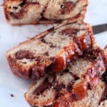three pieces of chocolate babka with almond filling