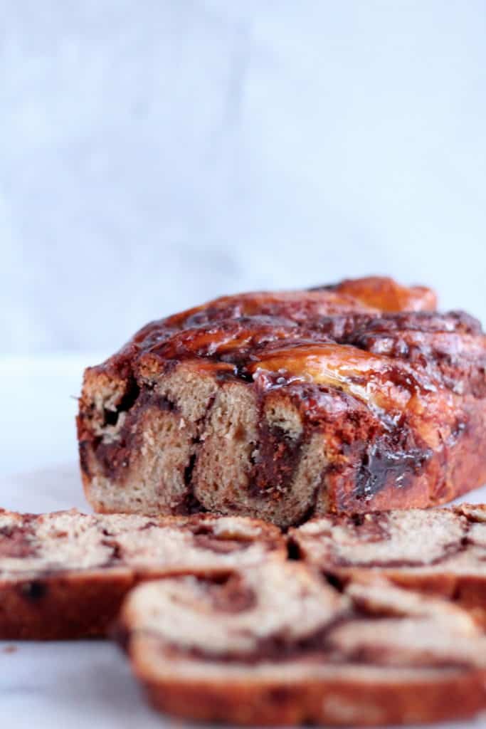 chocolate babka with almond filling cut in three slices