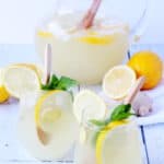 Ginger lemonade in two plastic glasses