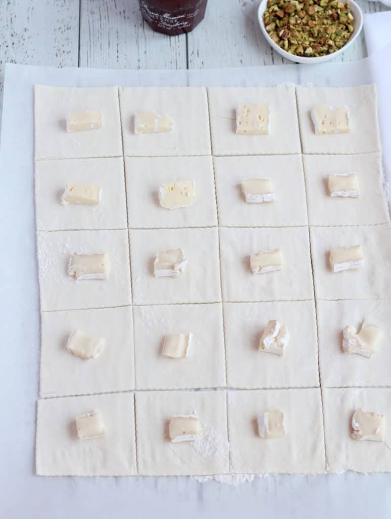 puff pastry cut in squares with brie pieces