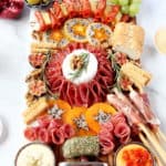 charcuterie and cheese board with fruit and dips