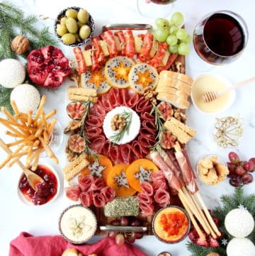 holiday spread on the table with deli meats and cheeses