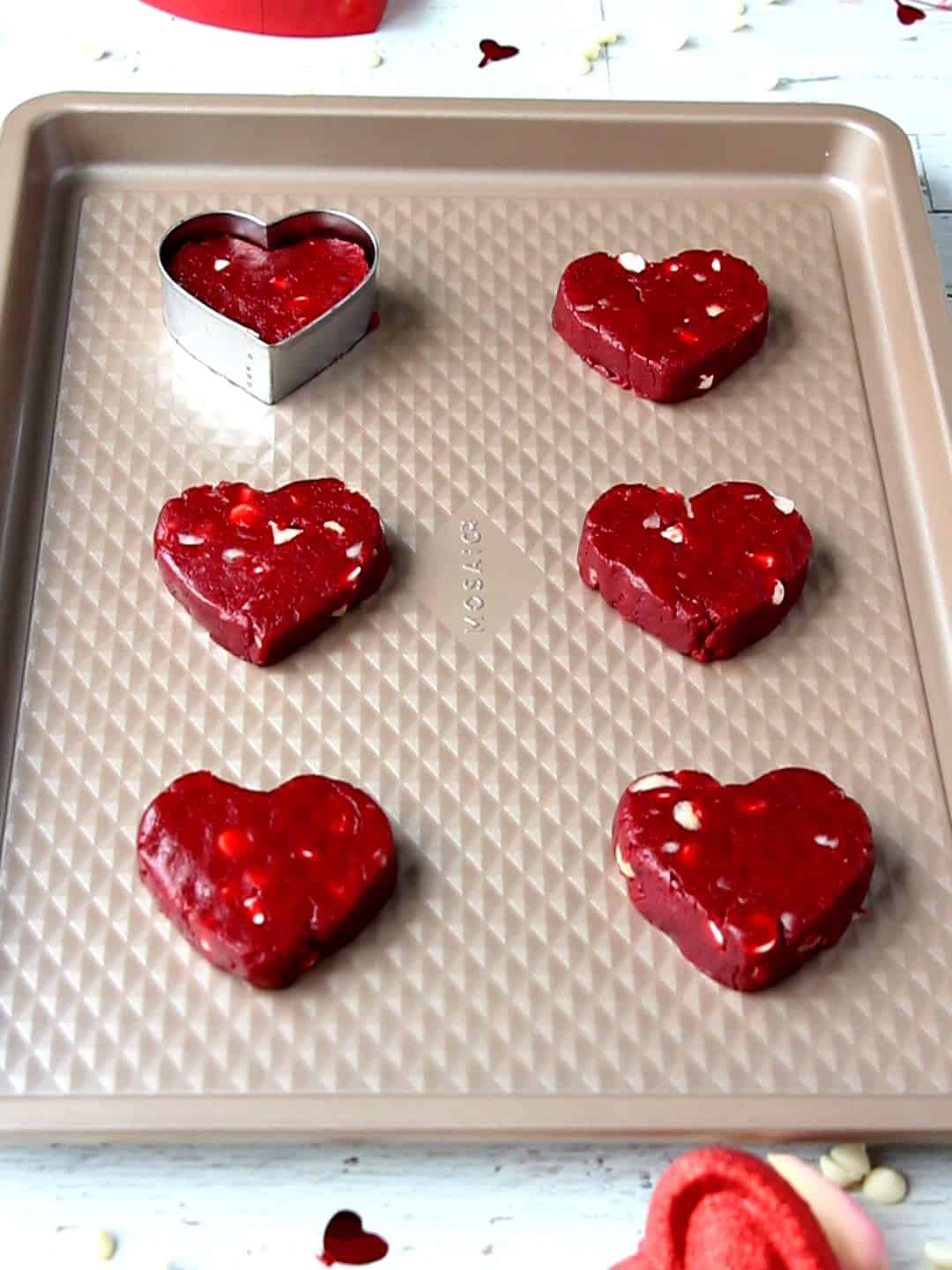 heart cookies on baking sheet ready to go to oven