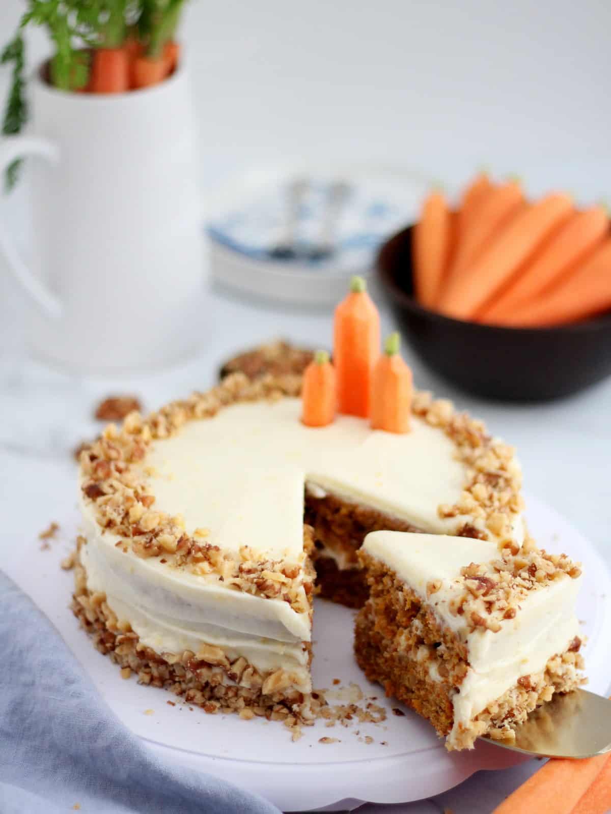 homemade carrot cake on white plate