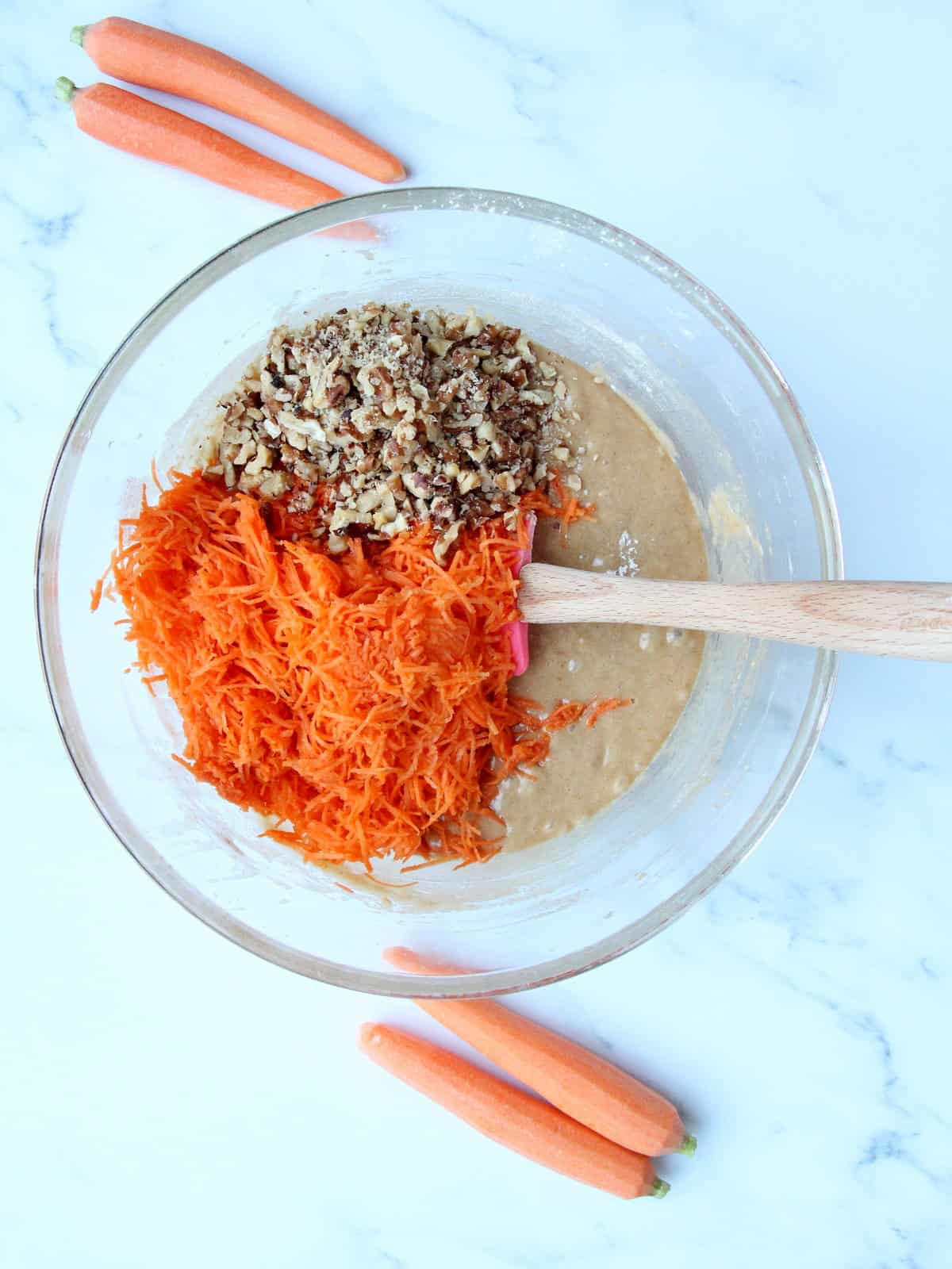 add grated carrots and chopped walnuts