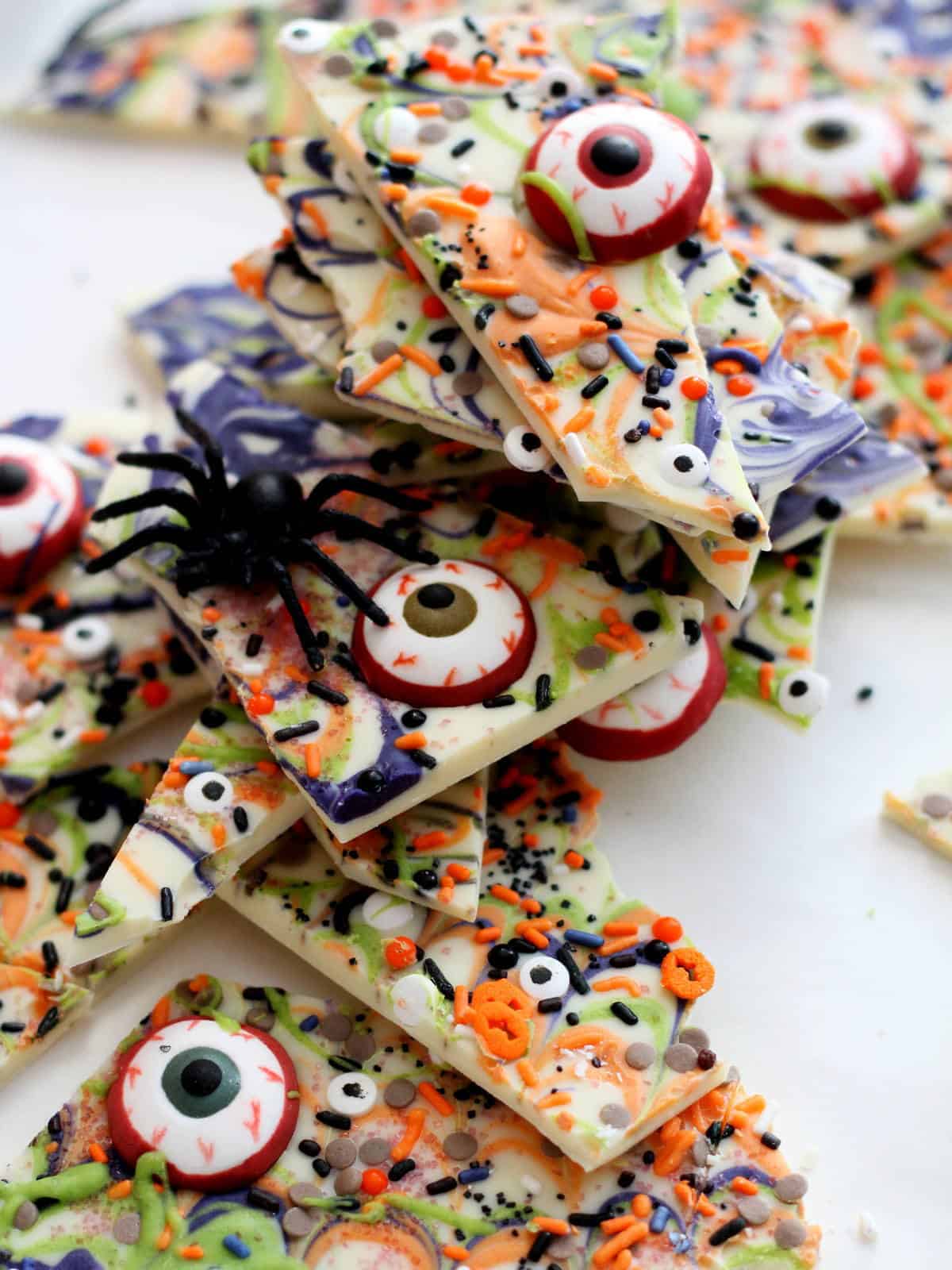 White chocolate bark with colourful sprinkles and Halloween edible decoration
