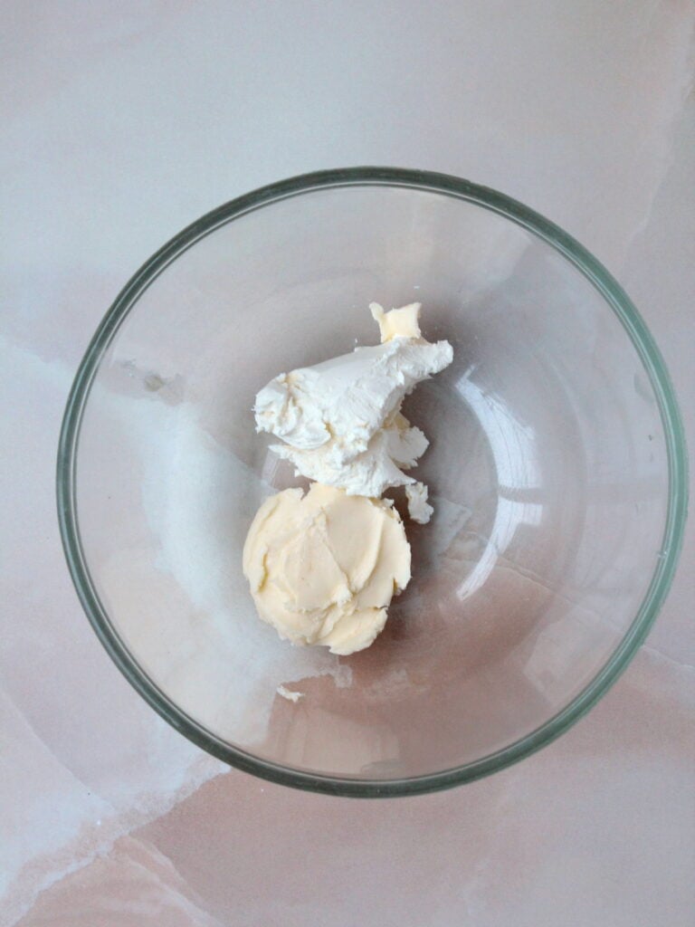 Mix together cream cheese and butter