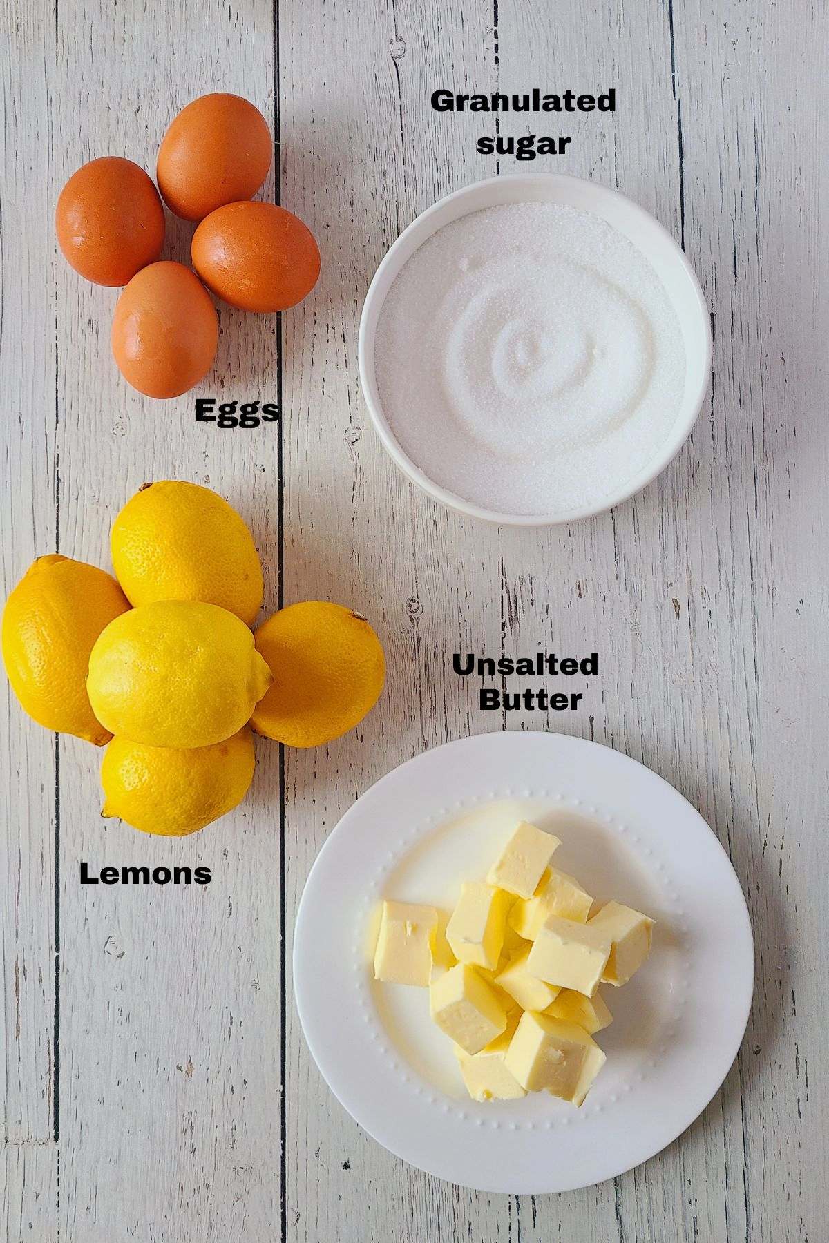 Ingredients for lemon curd:lemons, eggs, granulated sugar and unsalted butter
